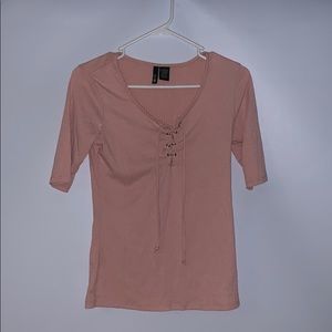 Mid sleeve top with crossing in the front